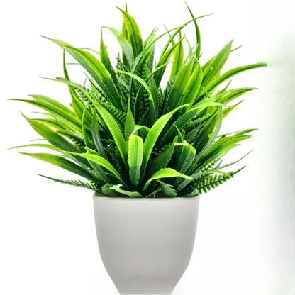 Planta artificial en maceta blanca