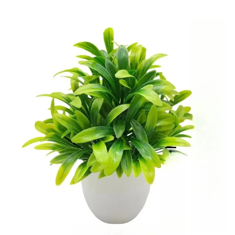 Planta artificial en maceta blanca