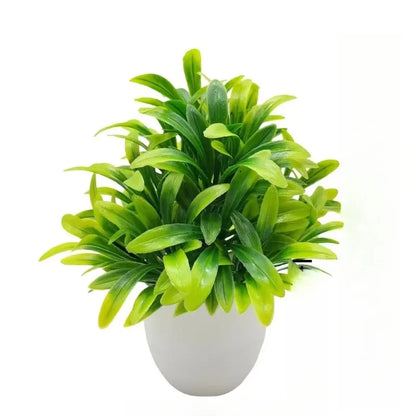 Planta artificial en maceta blanca
