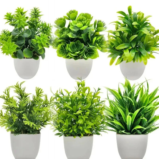 Planta artificial en maceta blanca